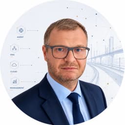 Łukasz Mikucki — founder of RAIL-TECH, portrait against a technical drawing of railway infrastructure